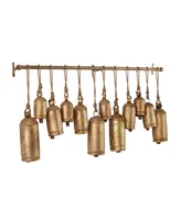 Rosemary Lane Bronze Metal Tibetan Inspired Meditation Decorative Cow Bell with Jute Hanging Rope and Rod 48" x 6" x 20"