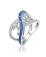 Sterling Silver Rhodium Plated with Blue Cubic Zirconia Criss-Cross Ring