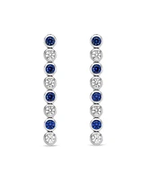 Lab Grown Blue and White Sapphire Bezel Set Drop Earrings in Sterling Silver