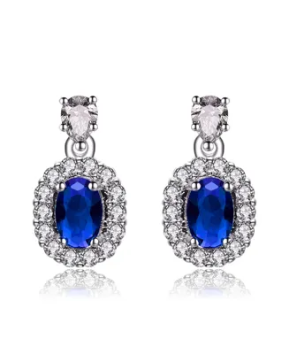 Genevive Sterling Silver White Gold Plated Sapphire Blue Oval Cubic Zirconia with Clear Pear and Round Cubic Zirconias Accent Earrings