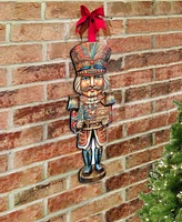 Designocracy Regal Nutcracker Prince Christmas Door Decor Wooden Wall Decor G. DeBrekht