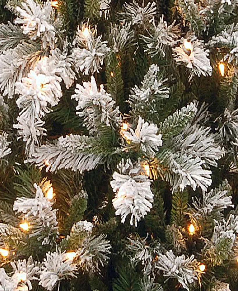 National Tree 7.5' Snowy Mountain Pine Slim Hinged Tree with 500 Clear Lights