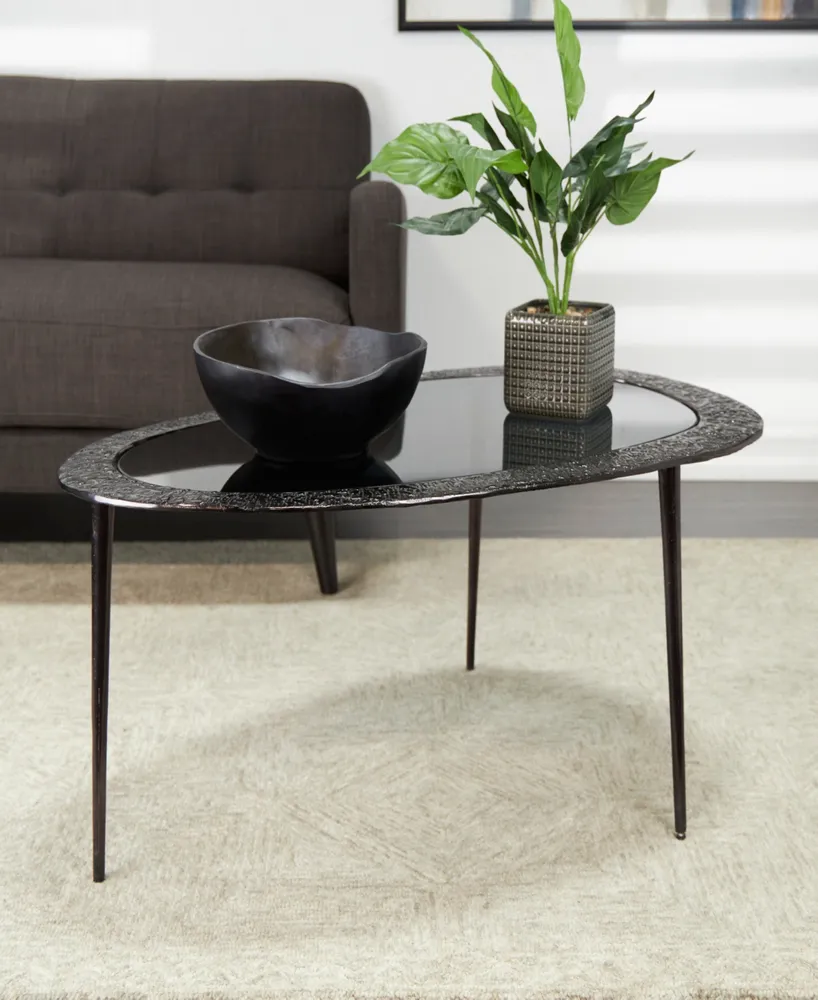 Rosemary Lane 30" x 25" x 18" Aluminum Abstract Oval Shaped Shaded Glass Top and Detailed Engravings Coffee Table