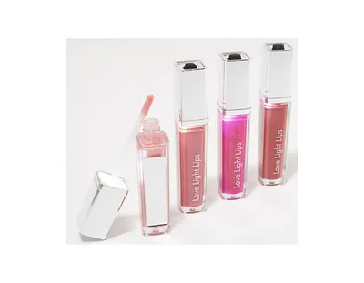 Love Light Lips Multi Pack. Lip gloss set with a light in the wand and a mirror on the bottle. Hydrating, nourishing formula with Aloe, Jojoba Oil, Sh