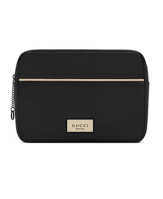 Free pouch with any Large or Jumbo Spray purchase from the Gucci Guilty Men's Collection