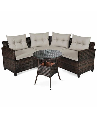 Gymax 4PCS Patio Furniture Set Outdoor Rattan Sectional w/ Cushioned Sofa Table