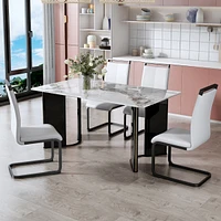 White marble table set with 4 chairs