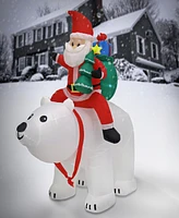 National Tree Company First Traditions Inflatable Santa Riding Polar Bear 6 ft.