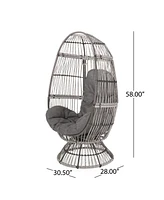 Cozy Swivel Egg Chair: Rattan Haven For Outdoor Relaxation