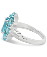 Swiss Blue Topaz Oval Halo Statement Ring (4-3/8 ct. t.w.) in Sterling Silver