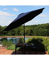 Sunbrella 9-Foot Patio Umbrella with Auto Tilt and Crank - Rust Resistant Aluminum Pole