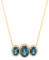 London Blue Topaz (4 ct. t.w.) & Diamond (1/4 ct. t.w.) Oval Trio Halo Pendant Necklace in 10k Gold, 16" + 2" extender