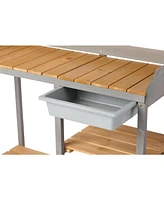 Outdoor potting bench with cabinet