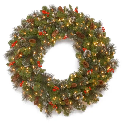 National Tree Company 30" Crestwood Spruce Wreath with Silver Bristle, 12 Cones, 12 Red Berries, Glitter and Battery Operated Led Lights with Timer