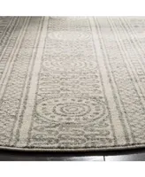 Safavieh Evoke Ivory and Silver 6'7" x 6'7" Round Area Rug