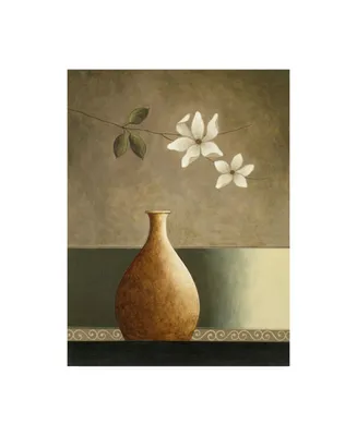 Pablo Esteban Flowers Over a Tan Vase Canvas Art
