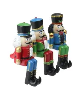 Northlight Set of 3 Red Blue and Green Nutcracker Christmas Stocking Holders 7.5"