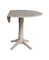 International Concepts 42" Round Dual Drop Leaf Pedestal Table