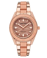 Anne Klein Women's Rose Gold-Tone and Light Pink Solar Ocean Work Plastic Bracelet Watch, 38.5mm - Two