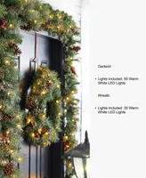 Glitzhome 4' Flocked Christmas Tree, Pre-Lit Glitter Wreath and Garland Set, 5 Piece