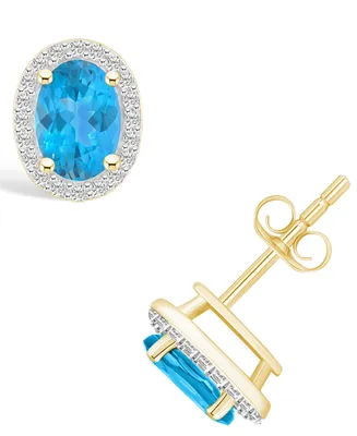 Blue Topaz (2 ct. t.w.) and Lab Grown Sapphire (1/5 ct. t.w.) Halo Studs in 10K Yellow Gold