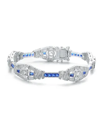 Genevive Sterling Silver Clear and Blue Cubic Zirconia Oval Link Bracelet