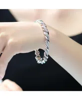 Genevive Sterling Silver White Gold Plated Clear Round Cubic Zirconia Wavy Twisted Bracelet