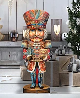 Designocracy Nutcracker with a Heartwarming Surprise 32" Outdoor Holiday Lawn Decor G. DeBrekht