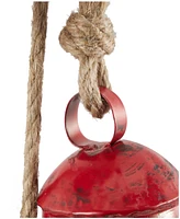 Rosemary Lane Metal Tibetan Inspired Decorative Cow Bell with Jute Hanging Rope