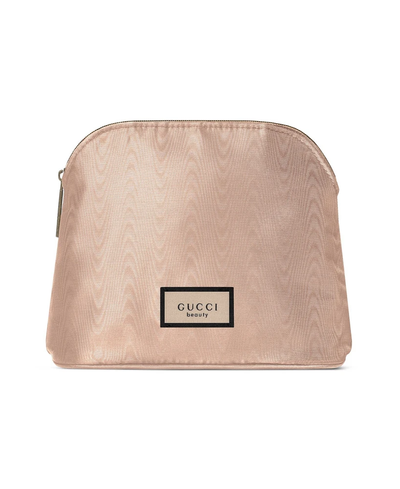 Free Gucci Bloom pouch with a $168 purchase from the Gucci Fragrance collection.