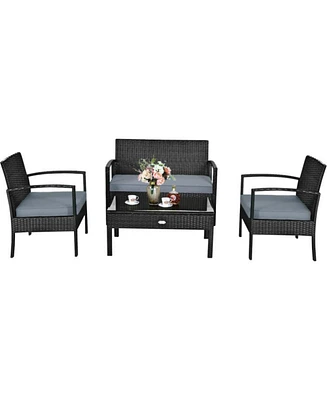 Sugift 4 Pieces Patio Rattan Cushioned Furniture Set with Loveseat and Table
