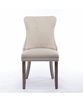 Streamdale Furniture 2 Beige Wingback Dining Chairs with Nailhead Trim & Wood Legs