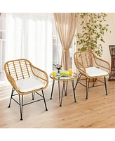 Vebreda 3 Pieces Rattan Furniture Set with Cushioned Chair Table