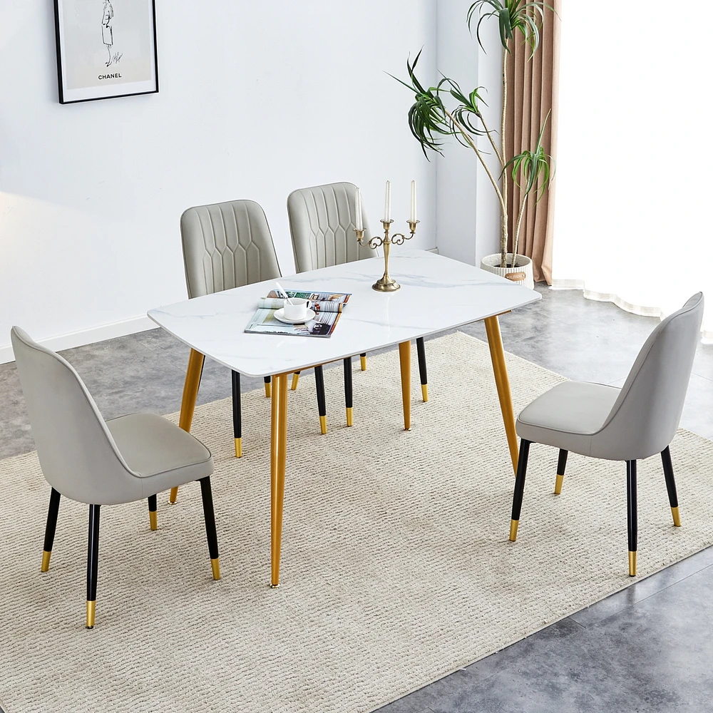 Simplie Fun Table and chair set.a morden table with White imitation marble patterned stone burning tabletop with golden metal legs.Paired with 4 chair