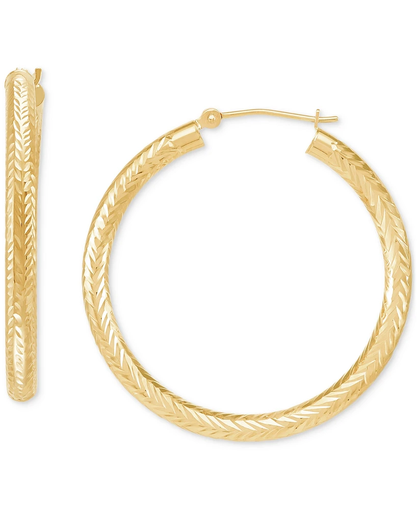 Polished Chevron Textured Tube Medium Hoop Earrings in 14K Yellow Gold, 1-3/8"