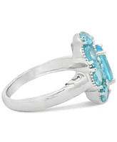 Swiss Blue Topaz Oval Halo Statement Ring (4-3/8 ct. t.w.) in Sterling Silver