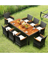 Gouun 9 Pieces Rattan Patio Dining Set with Acacia Wood Table and Cushioned Chair