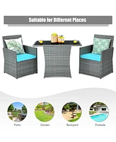 Gouun 3-Piece Patio Rattan Furniture Set with Cushioned Chairs and Glass Table