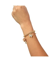 Juicy Couture Gold-Tone Charm Bracelet with Bow and Pave Details