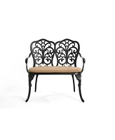 Cast aluminium bench with cushion