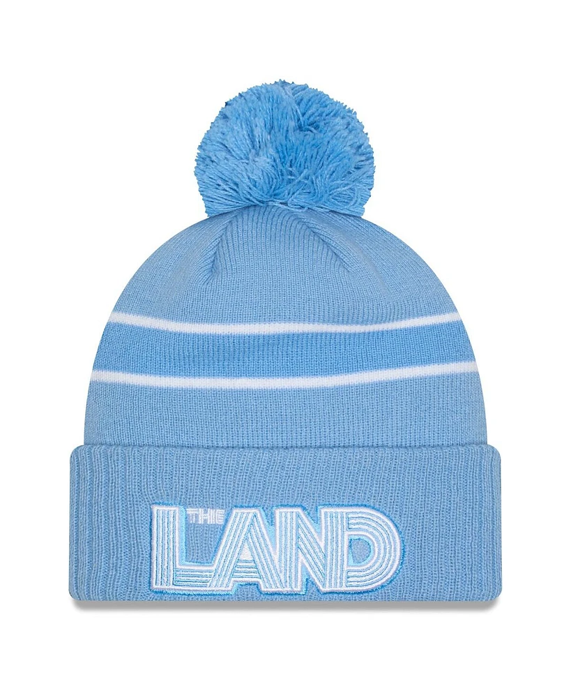 New Era Men's Light Blue Cleveland Cavaliers 2024/25 City Edition Cuffed with Pom Knit Hat