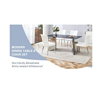 Black Marble-Patterned Table with Butterfly Legs & 4 Striped Pu Chairs