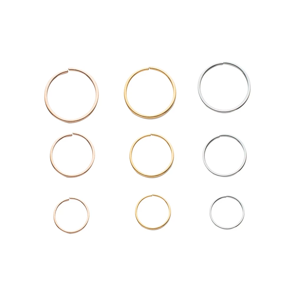 Multi-Pack Goldtone and Rose Goldtone Hoop Nose Rings 9 Pack - 20 Gauge