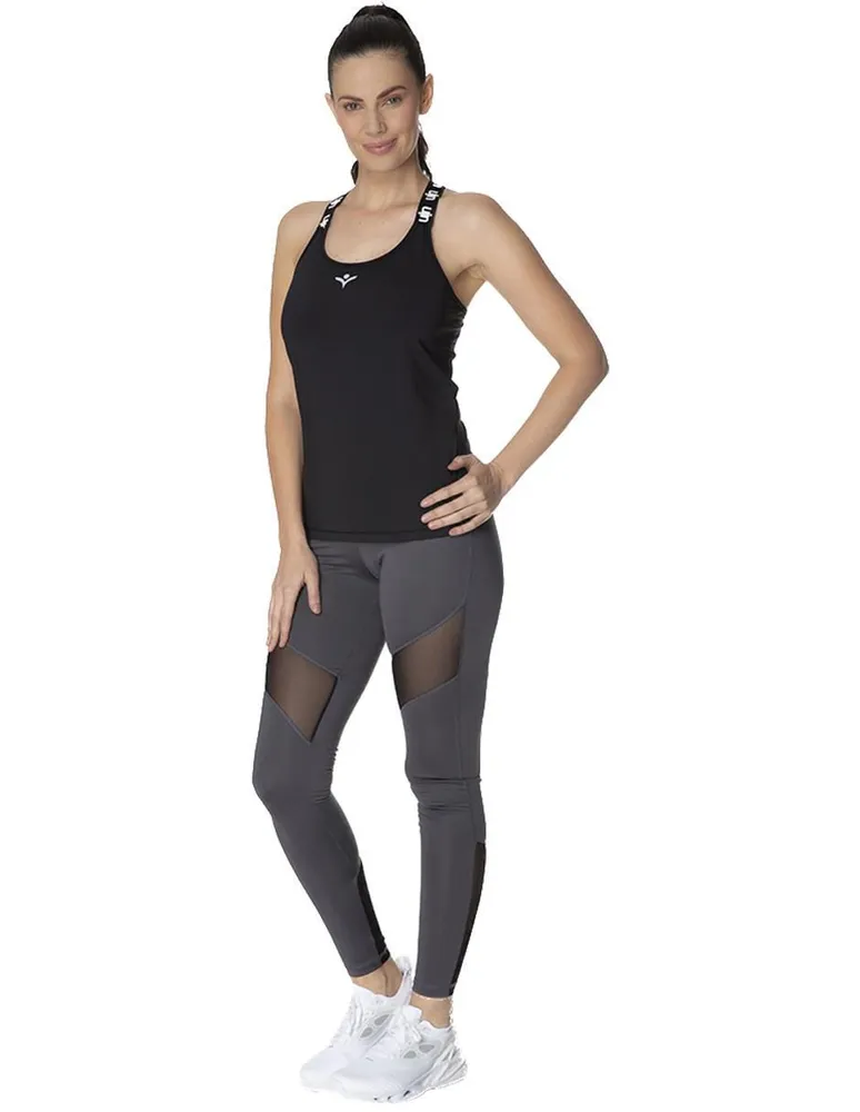 Conjunto deportivo UA Tricot para mujer