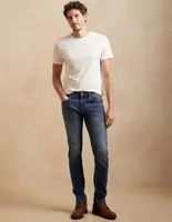 Jeans slim lavado obscuro para hombre