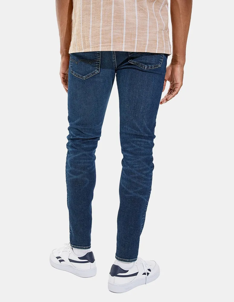 Jeans skinny American Eagle lavado deslavado para hombre