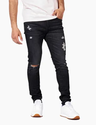 Jeans super skinny American Eagle lavado desgastado para hombre