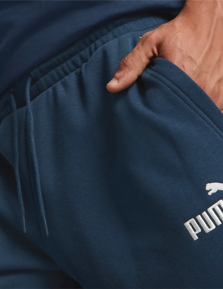 Pants Puma slim con bolsillos para hombre