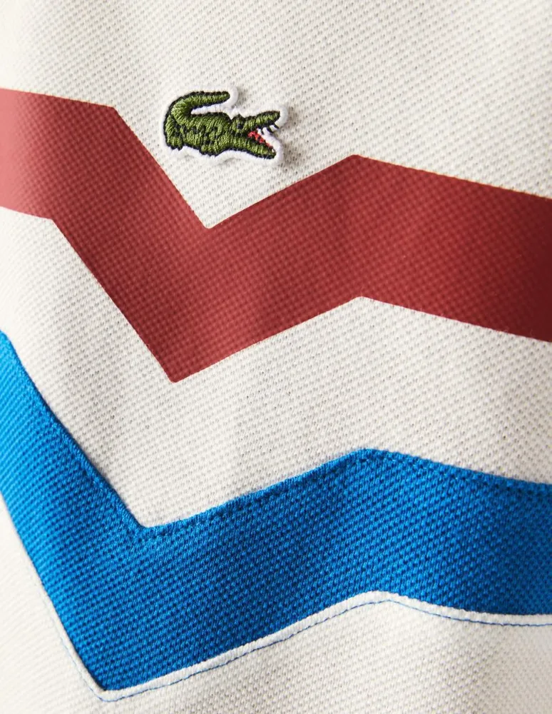 Playera tipo polo Lacoste estampado gráfico para hombre