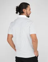 Playera tipo polo Calvin Klein estampado a lunares para hombre